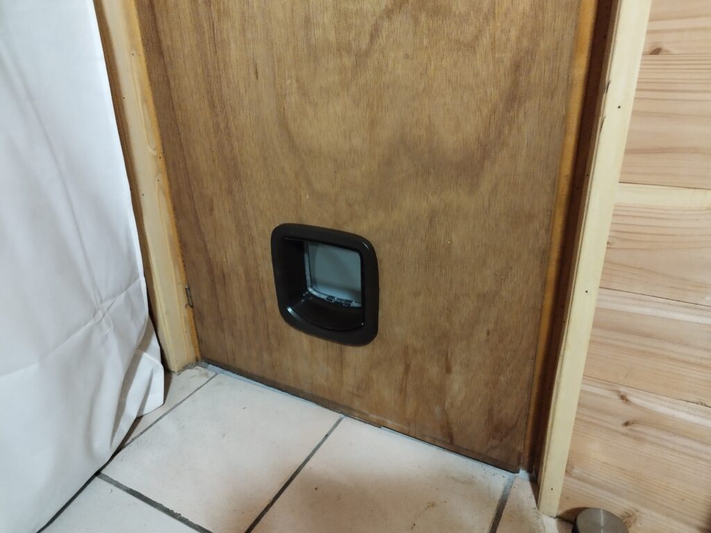 Chatière dans porte de garage à Sillingy Haute-Savoie